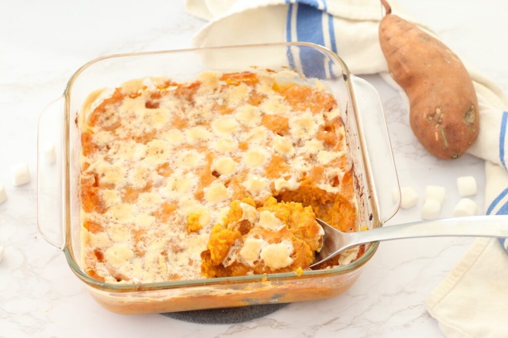 Mashed baked yams with small marshmallows on top