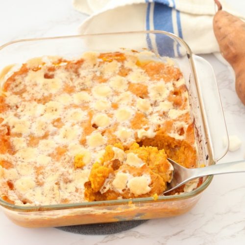 Mashed baked yams with small marshmallows on top