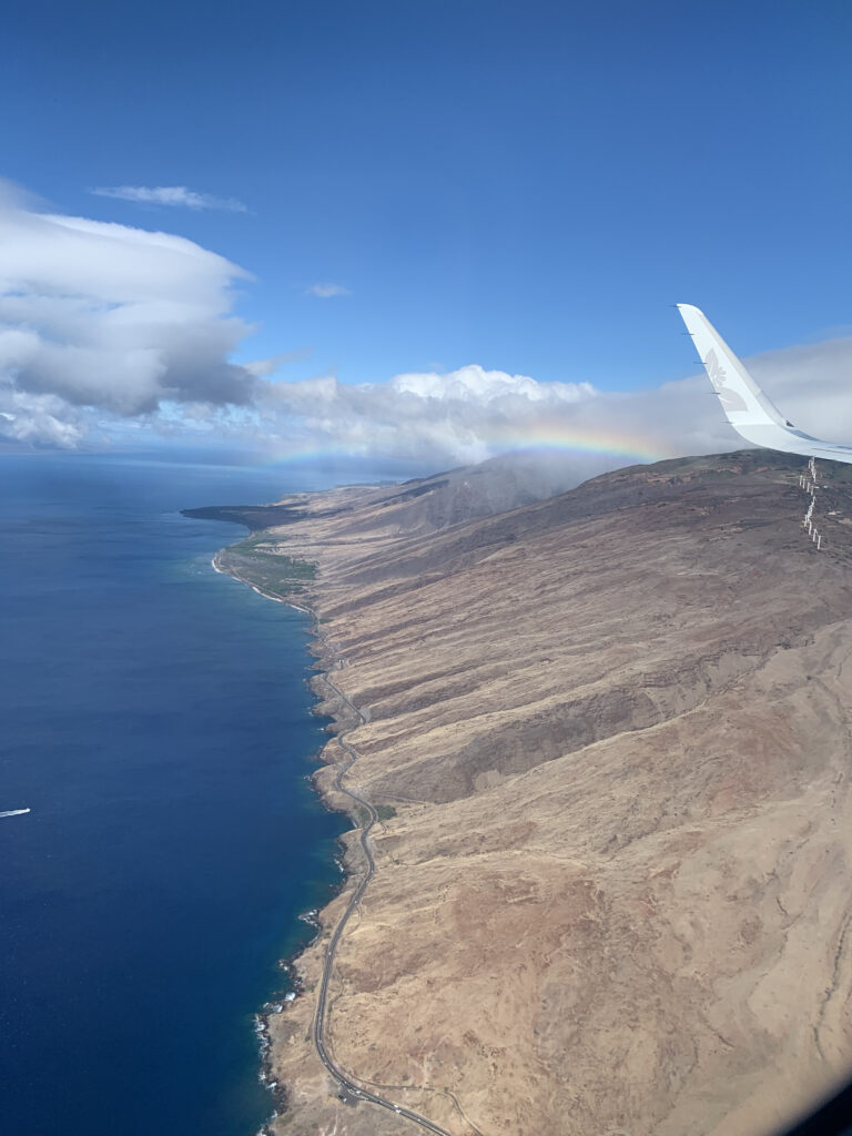 Maui island from the window seat of an airplane