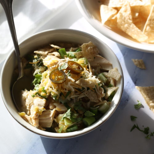 Chicken Chili in a bowl with tortilla chips