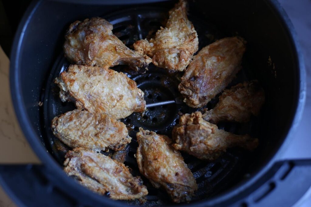 crispy wings in air fryer basket