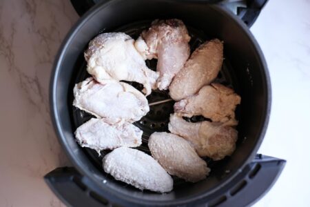 raw wings in the air fryer basket