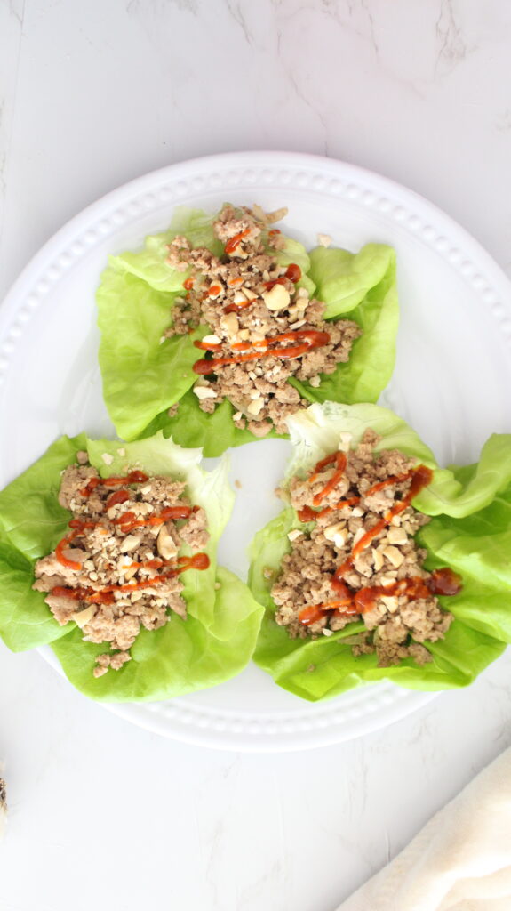 green lettuce wraps on. white plate 